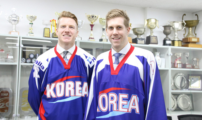 In this photo provided by the Korea Ice Hockey Association on March 31, 2016, Matt Dalton (R) and Eric Regan pose for a photo after putting on the South Korean men's ice hockey national team jersey.